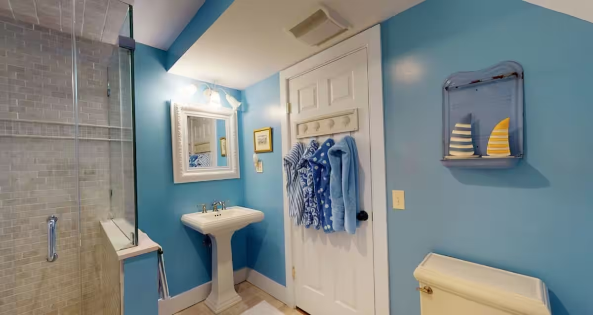 A bathroom in Crew with a walk-in shower.